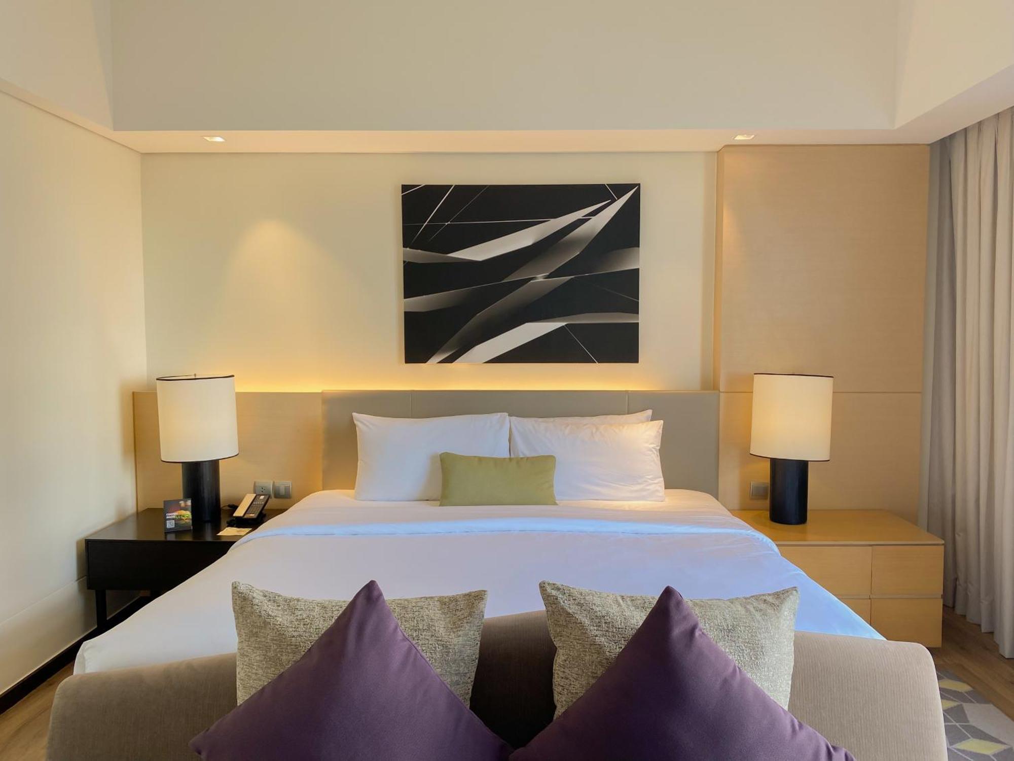 Seda Vertis North Quezon City Buitenkant foto A bedroom at the hotel