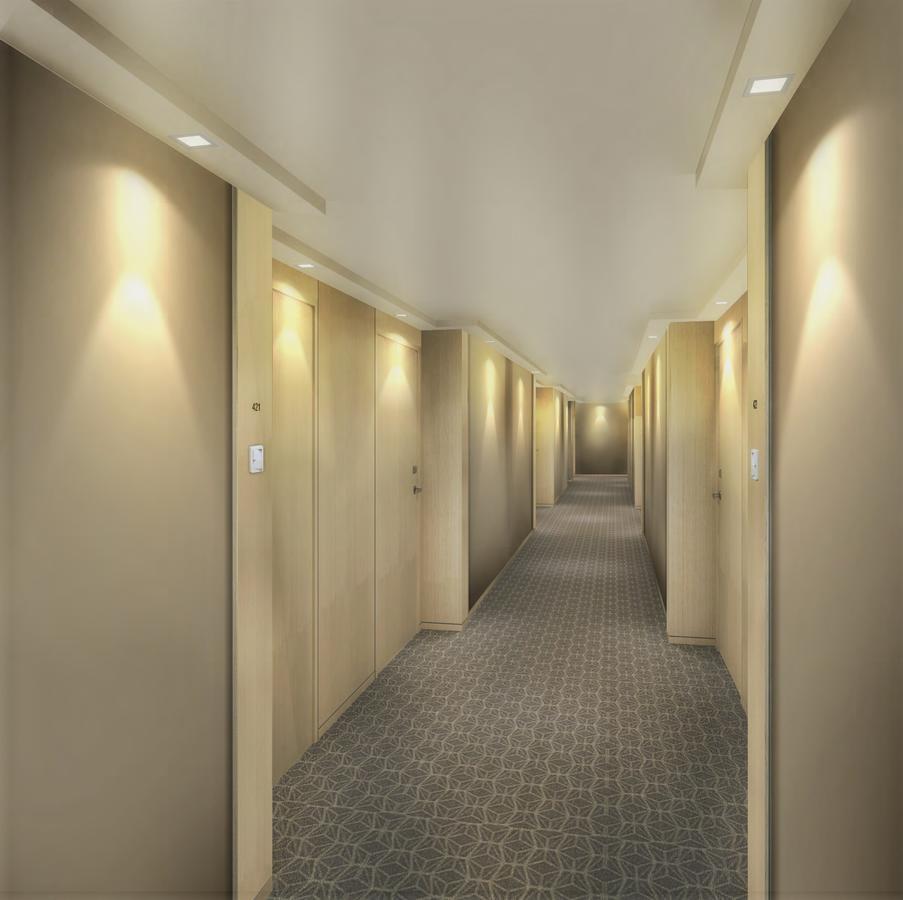 Seda Vertis North Quezon City Buitenkant foto A typical hotel corridor