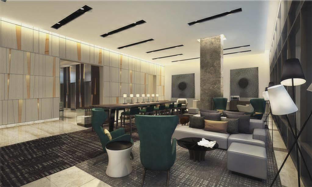Seda Vertis North Quezon City Buitenkant foto The lobby of the hotel