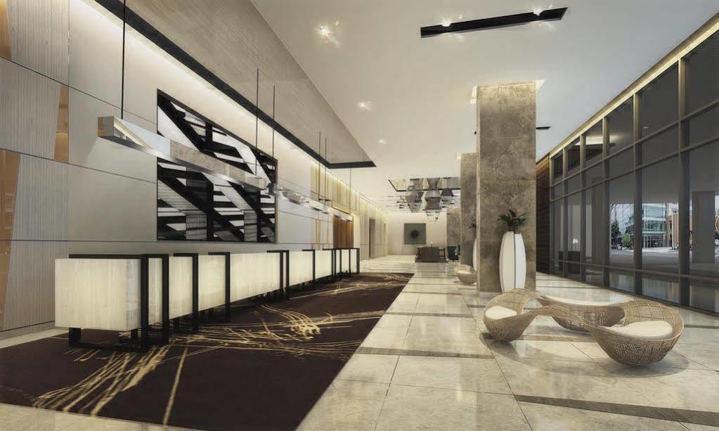 Seda Vertis North Quezon City Buitenkant foto The lobby of the hotel